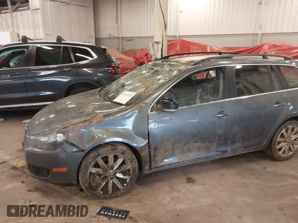 2014 Volkswagen Jetta SportWagen TDI w/Sunroof & Nav with VIN 3VWPL7AJ2EM627998, listed as a IAAI auction lot 41614718 with 134,203 mi miles. Bid and sale history available at carsss.com. Image 6.