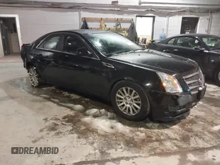 2011 Cadillac CTS z VIN 1G6DC5EY6B0170485, wystawiony jako IAAI lot #41346596 z przebiegiem 121 341 mil mil oraz . Historia ofert i sprzedaży dostępna na DreamBid. Obrazek 1.