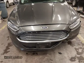 2015 Ford Fusion SE with VIN 1FA6P0H7XF5124074, listed as a IAAI auction lot 41658822 with 127,886 mi miles and . Bid and sale history available at carsss.com. Image 13.
