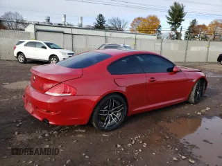 2009 BMW 6 Series 650i with VIN WBAEA53549CV92728, listed as a Copart auction lot 82610144 with 118,803 mi miles and Salvage Title. Bid and sale history available at carsss.com. Image 3.
