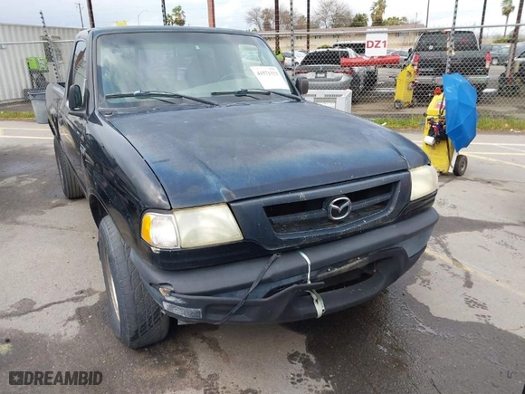 2003 Mazda B-Series 2WD Truck SX with VIN 4F4YR12D23TM09609, listed as a IAAI auction lot 41571323 with 194,860 mi miles. Bid and sale history available at carsss.com. Image 6.