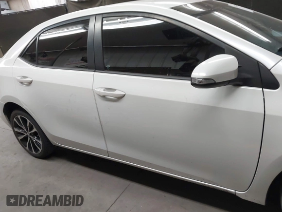2017 Toyota Corolla L with VIN 5YFBURHE7HP693037, listed as a IAAI auction lot 42304020 with 117,710 mi miles and . Bid and sale history available at DreamBid. Image 14.