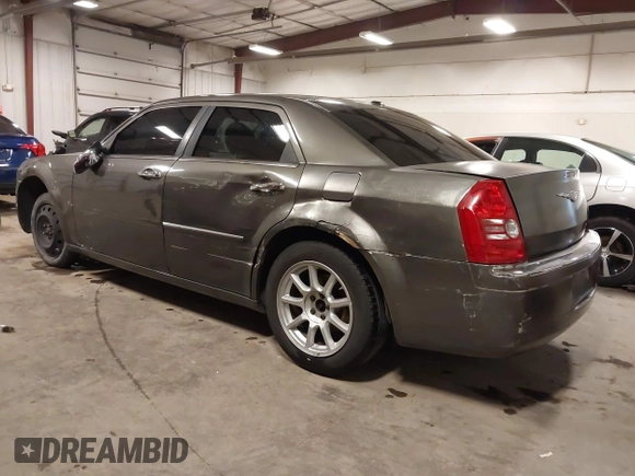 2010 Chrysler 300 Touring with VIN 2C3CA5CV9AH213299, listed as a IAAI auction lot 41754215 with 172,467 mi miles. Bid and sale history available at carsss.com. Image 3.