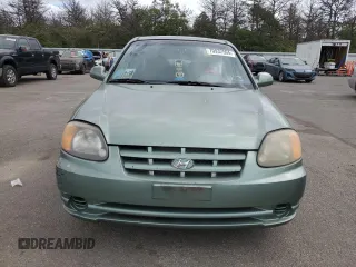 2003 Hyundai Accent GL with VIN KMHCG45CX3U497134, listed as a Copart auction lot 70932594 with 107,980 mi miles and Clean Title. Bid and sale history available at carsss.com. Image 5.