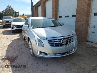 2013 Cadillac XTS Luxury with VIN 2G61P5S38D9180721, listed as a IAAI auction lot 41837476 with 132,222 mi miles. Bid and sale history available at carsss.com. Image 1.