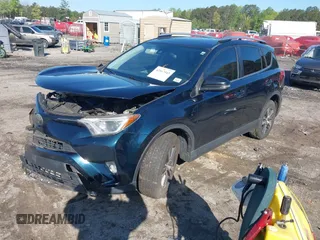 2018 Toyota RAV4 XLE with VIN JTMWFREV5JJ739619, listed as a IAAI auction lot 42017343 with 126,810 mi miles and . Bid and sale history available at DreamBid. Image 18.