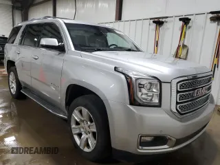 2015 GMC Yukon SLT with VIN 1GKS2BKC5FR615853, listed as a Copart auction lot 56153235 with 200,023 mi miles and Clean Title. Bid and sale history available at DreamBid. Image 4.