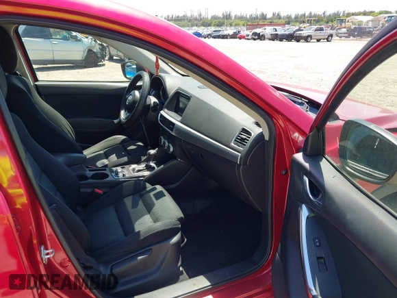 2016 Mazda CX-5 Touring with VIN JM3KE2CY6G0830409, listed as a IAAI auction lot 42049299 with 39,317 mi miles. Bid and sale history available at carsss.com. Image 5.