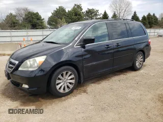 2007 Honda Odyssey Touring with VIN 5FNRL38847B022928, listed as a Copart auction lot 53869135 with 217,620 mi miles and Salvage Title. Bid and sale history available at DreamBid. Image 1.