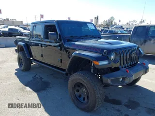 2021 Jeep Gladiator Rubicon z VIN 1C6JJTBM5ML524422, wystawiony jako IAAI lot #41377500 z przebiegiem 30 916 mil mil oraz . Historia ofert i sprzedaży dostępna na DreamBid. Obrazek 1.