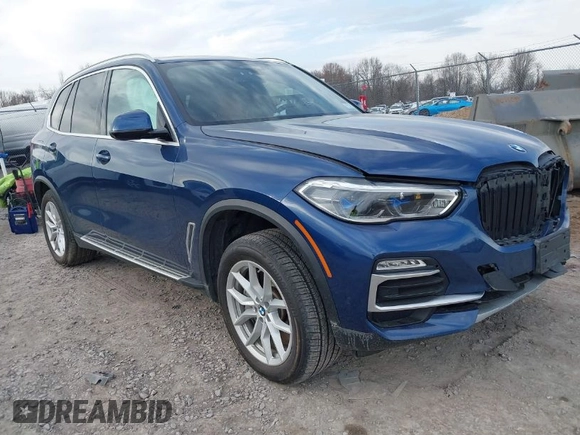 2021 BMW X5 xDrive45e with VIN 5UXTA6C07M9F32034, listed as a IAAI auction lot 41832720 with 28,453 mi miles. Bid and sale history available at carsss.com. Image 1.