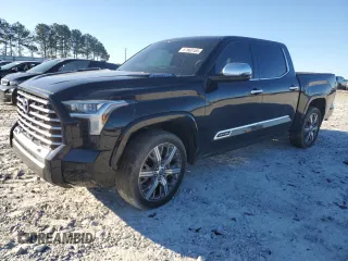 2023 Toyota Tundra Capstone Hybrid with VIN 5TFVC5DB0PX023978, listed as a Copart auction lot 87968165 with 24,625 mi miles and Salvage title. Bid and sale history available at DreamBid. Image 1.
