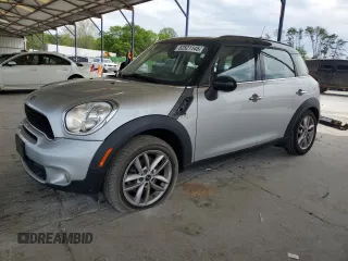 2014 MINI Countryman S with VIN WMWZC3C56EWP29211, listed as a Copart auction lot 52521145 with 91,396 mi miles and Salvage title. Bid and sale history available at DreamBid. Image 1.
