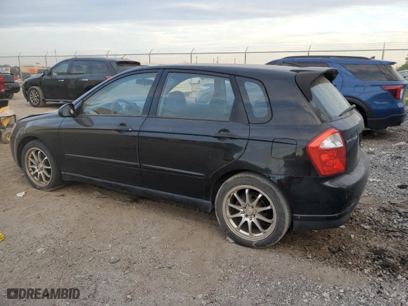 2005 Kia Spectra with VIN KNAFE161255088283, listed as a Copart auction lot 73654744 with 169,947 mi miles and Salvage Title. Bid and sale history available at carsss.com. Image 2.