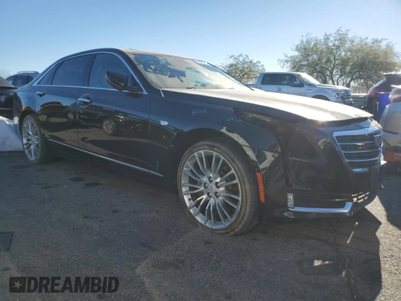 2017 Cadillac CT6 Premium Luxury AWD with VIN 1G6KH5R64HU182458, listed as a Copart auction lot 82795184 with 99,444 mi miles and Salvage title. Bid and sale history available at DreamBid. Image 4.
