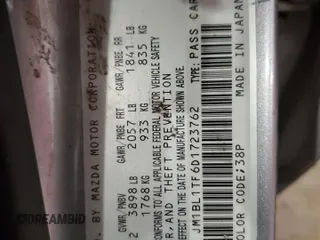 2013 Mazda 3 i SV z VIN JM1BL1TF6D1723762, wystawiony jako Copart lot #59711775 z przebiegiem Nie podano mil oraz Szkoda całkowita • Salvage title. Historia ofert i sprzedaży dostępna na DreamBid. Obrazek 12.