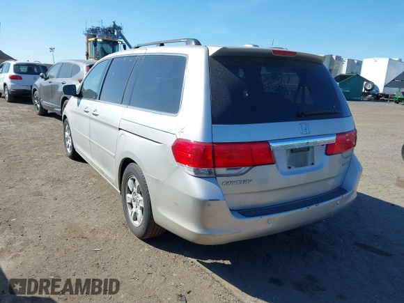 2008 Honda Odyssey Touring with VIN 5FNRL38888B005406, listed as a IAAI auction lot 41689635 with 164,340 mi miles. Bid and sale history available at carsss.com. Image 3.