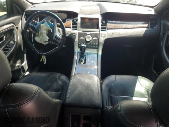 2013 Ford Taurus Limited with VIN 1FAHP2F85DG225363, listed as a Copart auction lot 56127255 with 128,660 mi miles and Salvage title. Bid and sale history available at DreamBid. Image 8.