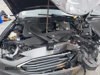 2018 Ford Fusion SE z VIN 3FA6P0LU8JR195096, wystawiony jako IAAI lot #41494088 z przebiegiem 114 007 mil mil oraz . Historia ofert i sprzedaży dostępna na DreamBid. Obrazek 10.
