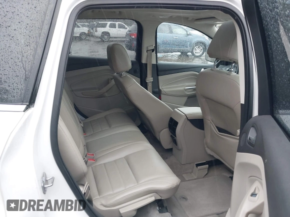 2014 Ford Escape Titanium with VIN 1FMCU9J94EUD49614, listed as a IAAI auction lot 42005864 with 87,779 mi miles. Bid and sale history available at carsss.com. Image 8.