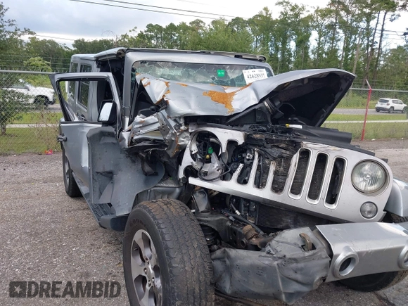 2016 Jeep Wrangler Unlimited Sahara with VIN 1C4BJWEG3GL240859, listed as a IAAI auction lot 42628937 with 103,378 mi miles and . Bid and sale history available at DreamBid. Image 6.
