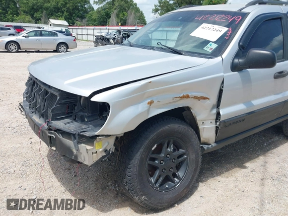 2002 Jeep Grand Cherokee Laredo with VIN 1J4GX48S32C288387, listed as a IAAI auction lot 42212249 with 151,028 mi miles and . Bid and sale history available at DreamBid. Image 6.
