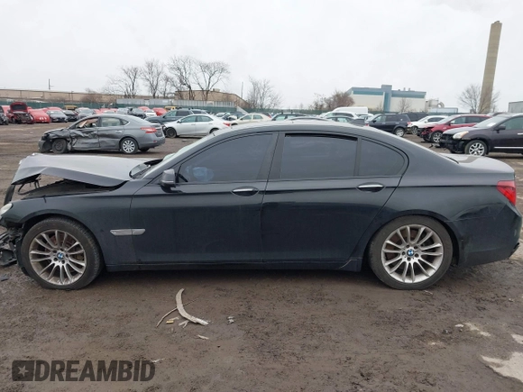 2015 BMW 7 Series 750i xDrive with VIN WBAYB6C59FD965820, listed as a IAAI auction lot 41558215 with 142,617 mi miles. Bid and sale history available at carsss.com. Image 13.