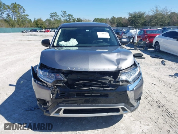 2020 Mitsubishi Outlander ES z VIN JA4AD2A37LJ001216, wystawiony jako IAAI lot #41623939 z przebiegiem 66 282 mil mil oraz . Historia ofert i sprzedaży dostępna na DreamBid. Obrazek 12.