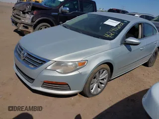 2011 Volkswagen CC Sport with VIN WVWMP7AN0BE723840, listed as a IAAI auction lot 42141612 with 155,616 mi miles. Bid and sale history available at carsss.com. Image 2.