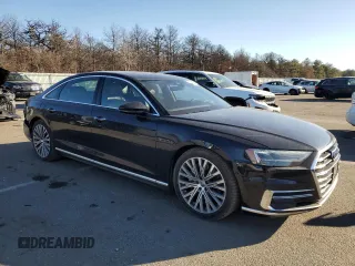 2019 Audi A8 z VIN WAU8DAF87KN004768, wystawiony jako Copart lot #88218675 z przebiegiem 42 354 mil mil oraz Szkody całkowita. Historia ofert i sprzedaży dostępna na DreamBid. Obrazek 4.