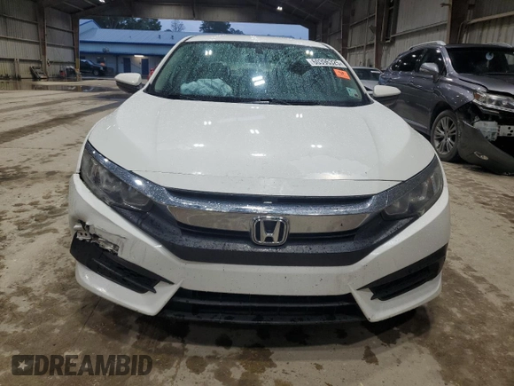 2017 Honda Civic LX z VIN 19XFC2F55HE073366, wystawiony jako Copart lot #60396325 z przebiegiem 135 910 mil mil oraz Szkoda całkowita • Salvage title. Historia ofert i sprzedaży dostępna na DreamBid. Obrazek 5.