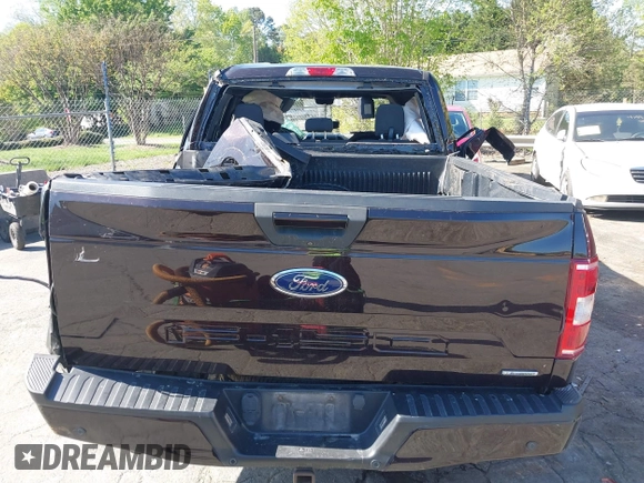 2018 Ford F-150 XL z VIN 1FTEW1EP9JFA92904, wystawiony jako IAAI lot #41975999 z przebiegiem 197 463 mil mil oraz . Historia ofert i sprzedaży dostępna na DreamBid. Obrazek 16.