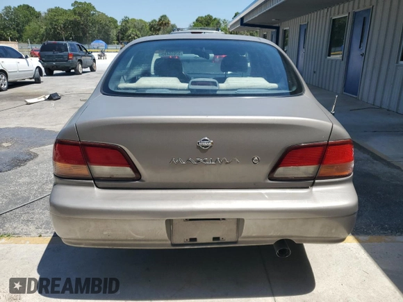 1998 Nissan Maxima GXE с VIN JN1CA21D0WT525657, выставлен на аукционе Copart как лот 57055485 с пробегом Не указан миль и Списание • Salvage title. История ставок и продаж доступна на DreamBid. Изображение 6.