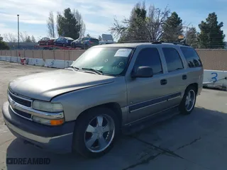 2001 Chevrolet Tahoe LS with VIN 1GNEK13T51J203013, listed as a IAAI auction lot 41886371 with 218,779 mi miles. Bid and sale history available at carsss.com. Image 6.