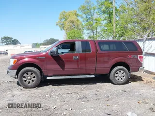 2010 Ford F-150 XL with VIN 1FTFX1EV6AFC58618, listed as a IAAI auction lot 42029696 with 128,258 mi miles. Bid and sale history available at carsss.com. Image 13.