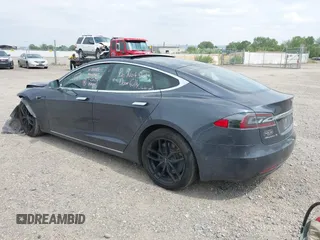2019 Tesla Model S 75D with VIN 5YJSA1E22KF300407, listed as a IAAI auction lot 40034839 with 59,178 mi miles and . Bid and sale history available at DreamBid. Image 3.
