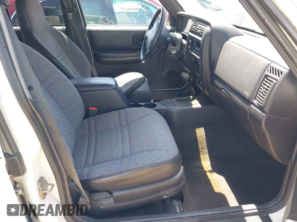 1999 Jeep Cherokee Sport with VIN 1J4FT68S1XL522018, listed as a IAAI auction lot 42551567 with 180,221 mi miles and . Bid and sale history available at DreamBid. Image 5.