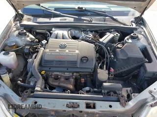 2003 Toyota Avalon XL z VIN 4T1BF28B93U274928, wystawiony jako IAAI lot #42034461 z przebiegiem 150 549 mil mil oraz . Historia ofert i sprzedaży dostępna na DreamBid. Obrazek 10.