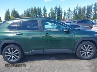2023 Toyota Corolla Cross XLE with VIN 7MUEAAAG6PV052816, listed as a IAAI auction lot 42386639 with 42,736 mi miles and . Bid and sale history available at DreamBid. Image 14.