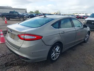 2015 Ford Fusion SE with VIN 3FA6P0H76FR296583, listed as a IAAI auction lot 41917464 with 232,978 mi miles. Bid and sale history available at carsss.com. Image 4.