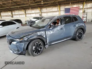 2023 Mazda CX-50 Meridian Edition z VIN 7MMVABXY5PN141783, wystawiony jako Copart lot #57098205 z przebiegiem 25 422 mil mil oraz Szkoda całkowita • Salvage title. Historia ofert i sprzedaży dostępna na DreamBid. Obrazek 1.