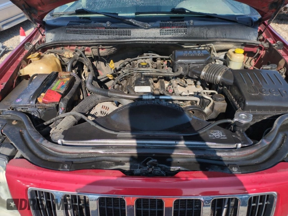 2004 Jeep Grand Cherokee Laredo with VIN 1J4GW48S54C363256, listed as a Copart auction lot 61862615 with 163,721 mi miles and Salvage title. Bid and sale history available at DreamBid. Image 11.