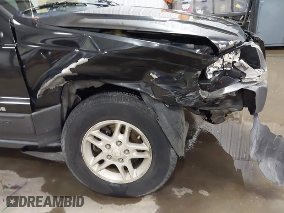 2004 Jeep Grand Cherokee Laredo with VIN 1J4GW48N84C367215, listed as a IAAI auction lot 41352098 with 165,485 mi miles and . Bid and sale history available at DreamBid. Image 6.