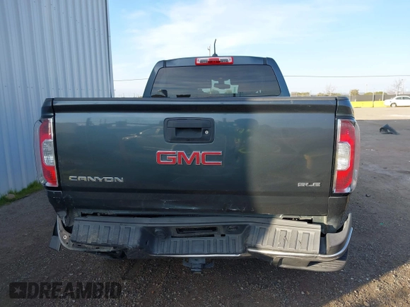 2015 GMC Canyon 2WD SLE with VIN 1GTG5BE35F1120622, listed as a IAAI auction lot 41421685 with 132,224 mi miles. Bid and sale history available at carsss.com. Image 16.