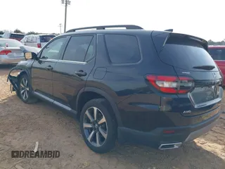 2023 Honda Pilot Elite z VIN 5FNYG1H82PB045029, wystawiony jako IAAI lot #41779289 z przebiegiem 27 484 mil mil oraz . Historia ofert i sprzedaży dostępna na DreamBid. Obrazek 3.