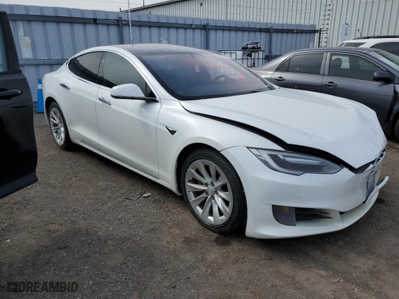 2017 Tesla Model S 100D with VIN 5YJSA1E24HF186757, listed as a Copart auction lot 51511745 with 242,779 mi miles and Salvage Title. Bid and sale history available at carsss.com. Image 4.