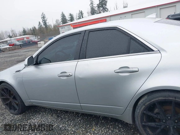 2009 Cadillac CTS RWD with VIN 1G6DF577890171787, listed as a IAAI auction lot 41883724 with 146,251 mi miles and . Bid and sale history available at carsss.com. Image 14.