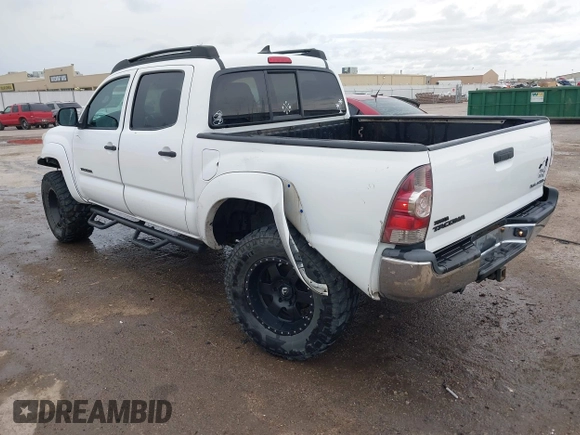 2014 Toyota Tacoma with VIN 3TMLU4EN8EM139665, listed as a IAAI auction lot 41925143 with 190,690 mi miles and . Bid and sale history available at DreamBid. Image 3.
