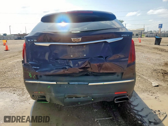 2021 Cadillac XT5 AWD Luxury z VIN 1GYKNBR44MZ162883, wystawiony jako Copart lot #59623725 z przebiegiem 50 006 mil mil oraz Szkoda całkowita • Salvage title. Historia ofert i sprzedaży dostępna na DreamBid. Obrazek 6.