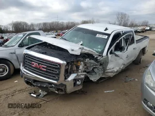 2015 GMC Sierra 2500HD available WiFi SLT with VIN 1GT12ZE86FF660390, listed as a Copart auction lot 82518914 with 0 mi miles and Salvage Title. Bid and sale history available at carsss.com. Image 1.